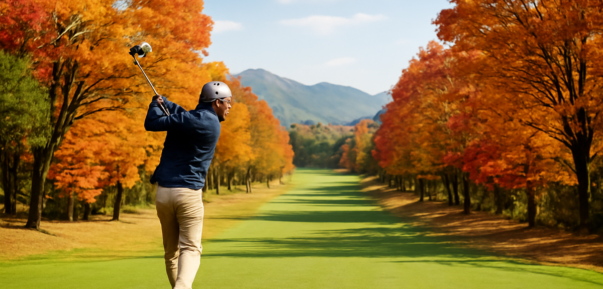 Golfer teeing off on a tree-lined fairway in autumn colors, Gifu highland scenery, photorealistic, n