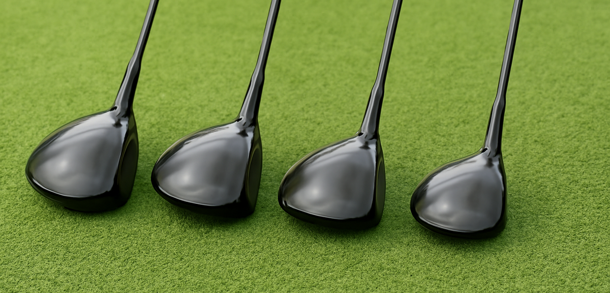 Row of golf drivers with different head sizes lined up on turf, photorealistic, no text